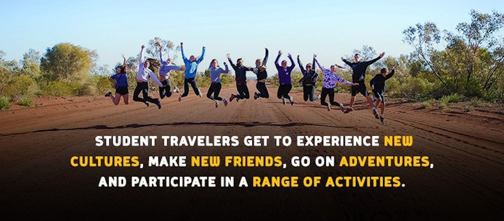 Student travelers jumping for joy in the Australian Outback