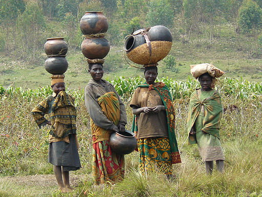 Batwa women in Burundi watch a community event.
