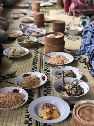 Students share lunch with the Radical Grandma Collective in Na Nong Bong, Thailand, during the 2019 Critical Issues Summit