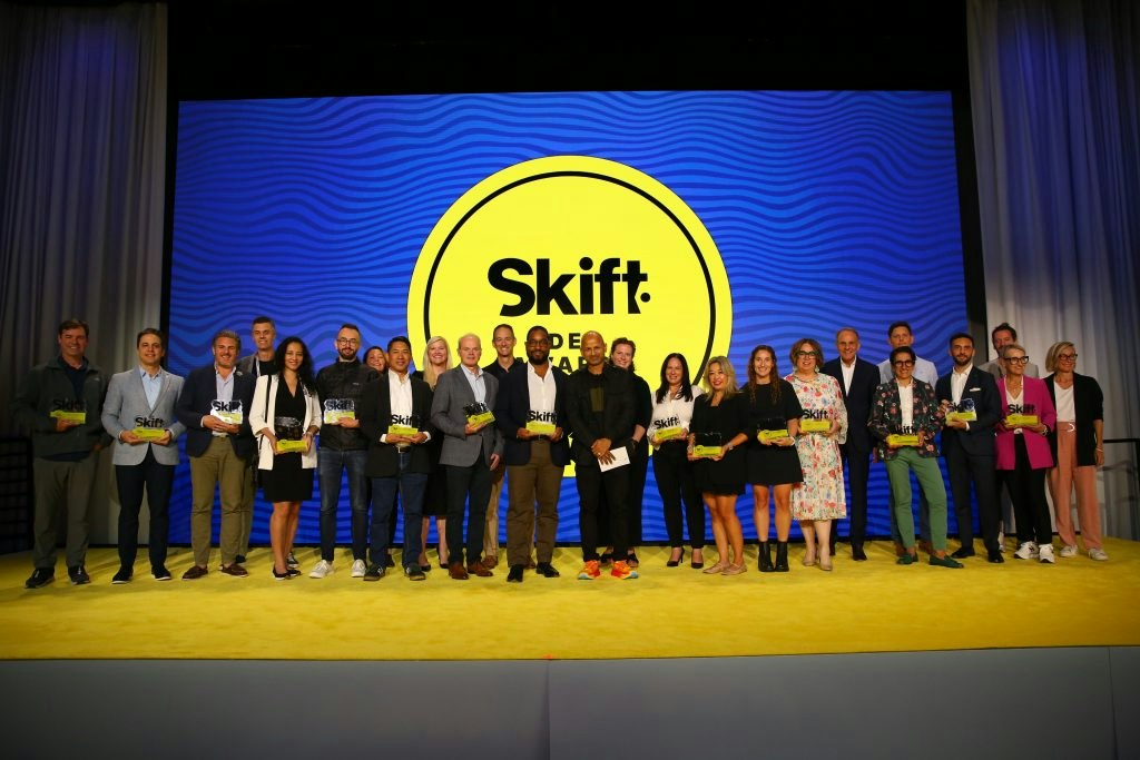 Anna Beckerman accepts Skift idea award for Rustic PAthways