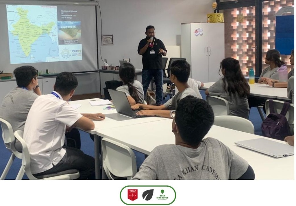 Group photo of volunteers and students post-project.