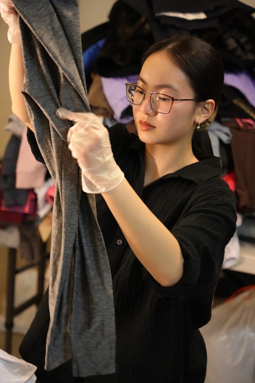 Audrey working with Everything Starts Small team members.