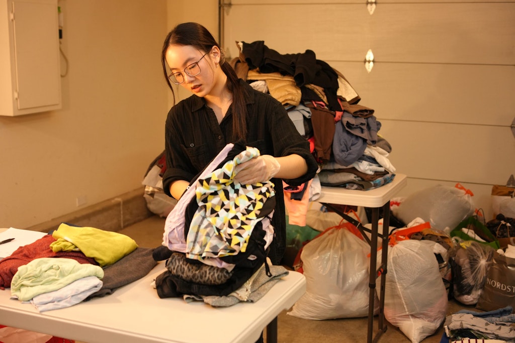 Audrey reflecting on her project during a break.