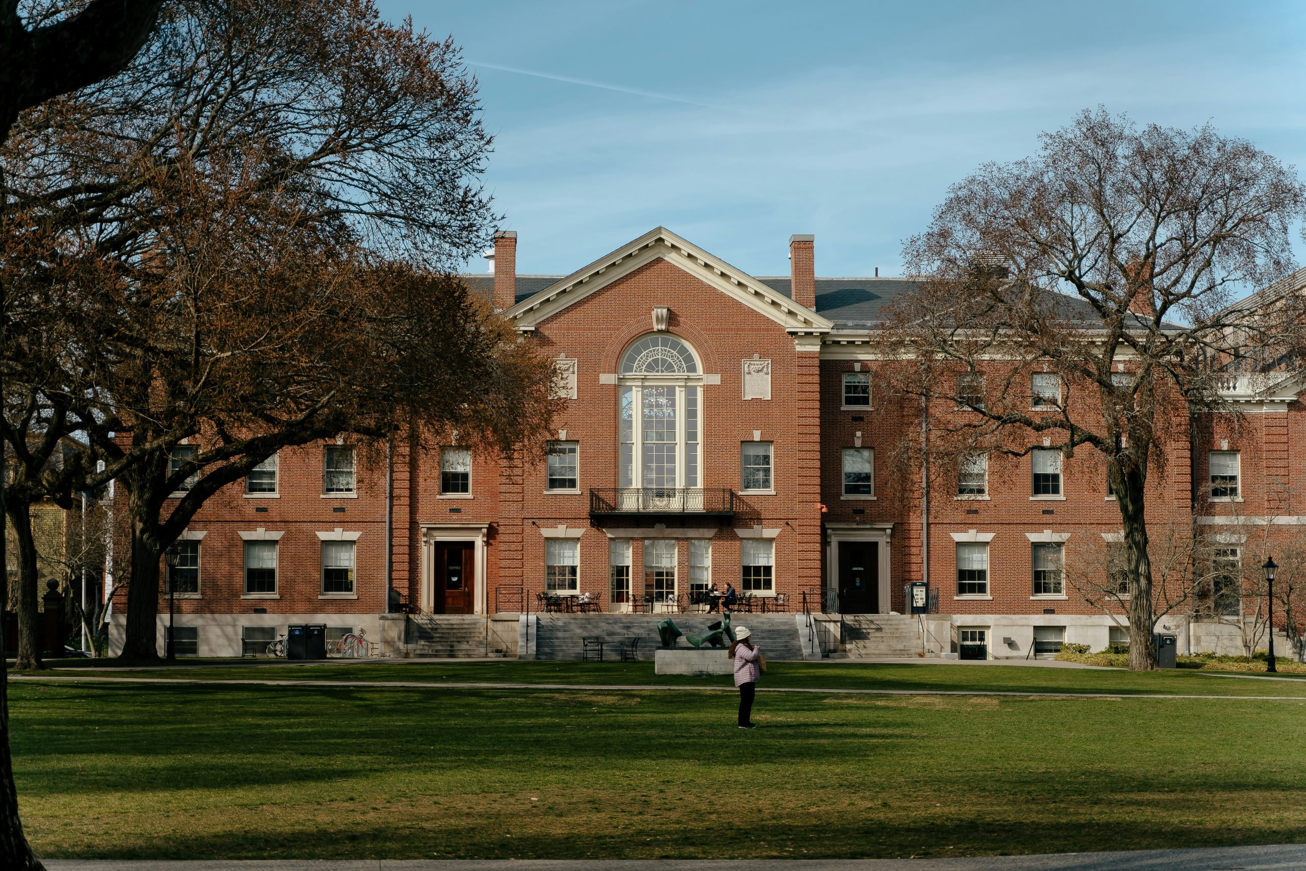 A historic building on the green lawn of Brown University’s campus.