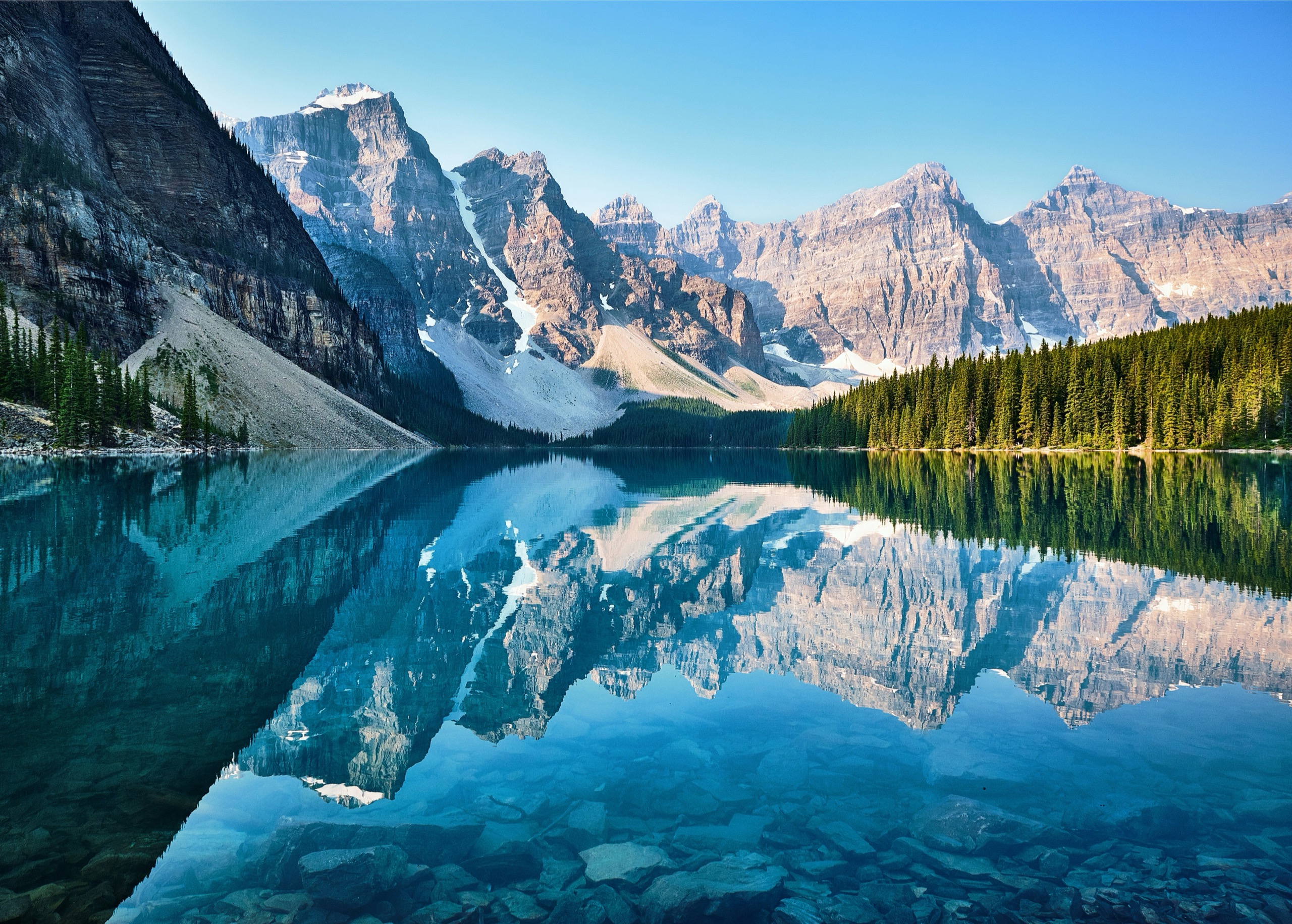 Moraine Lake's turquoise water below the Valley of the Ten Peaks in Banff National Park.