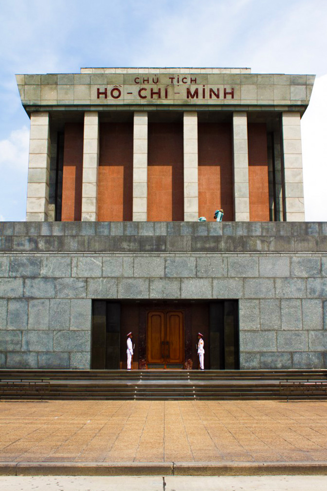 Honor guards stand at the entrance of the Ho Chi Minh Mausoleum in Hanoi