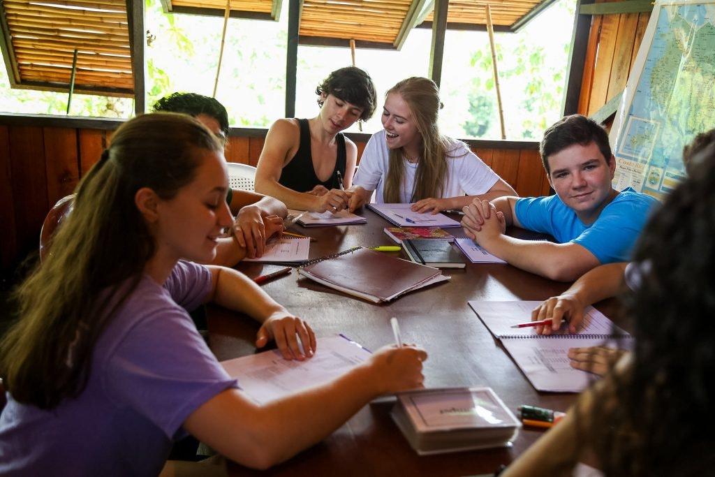Group of students studying together at a table