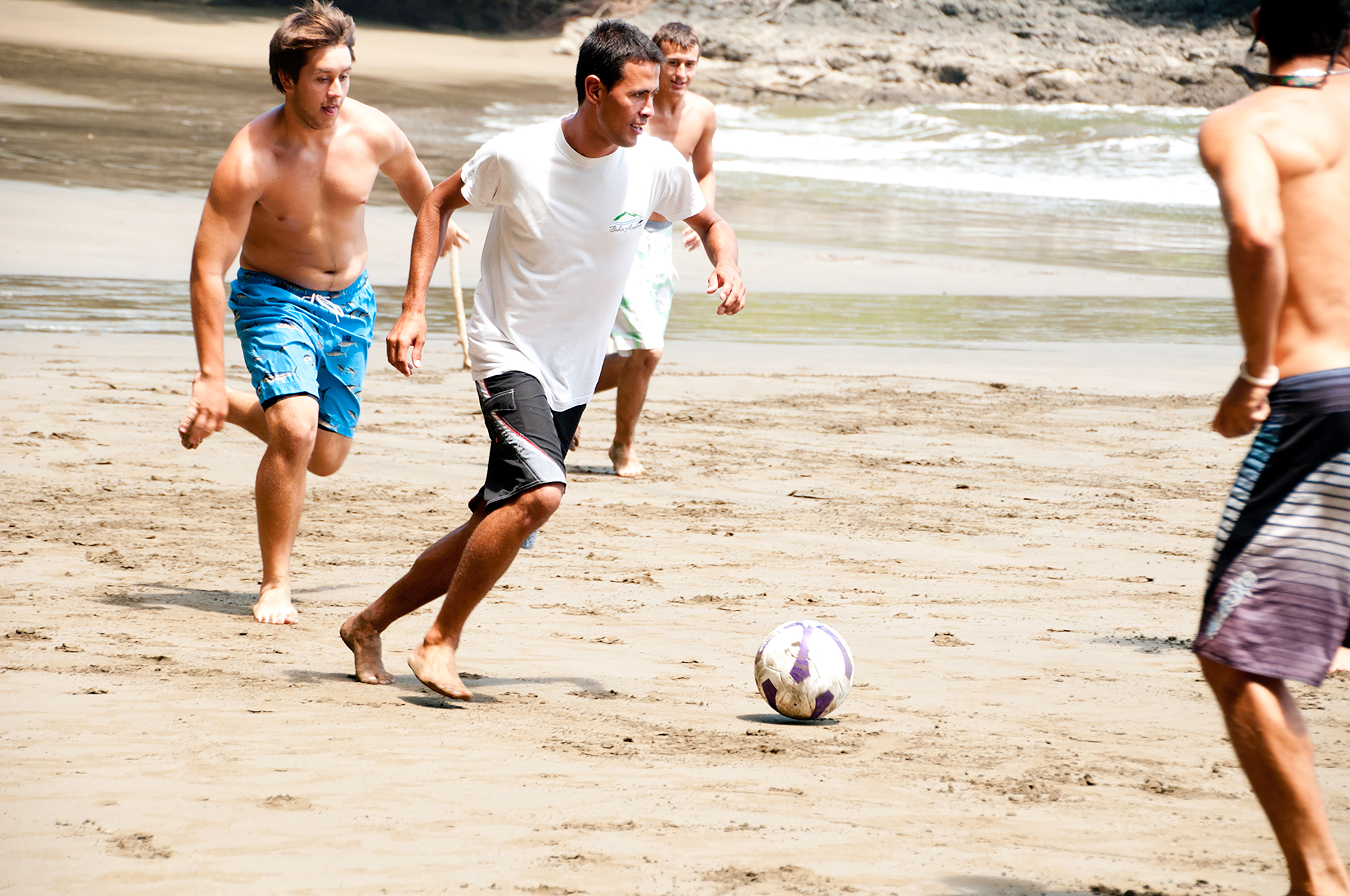 Rustic Pathways students enjoy a game of soccer on the beach.