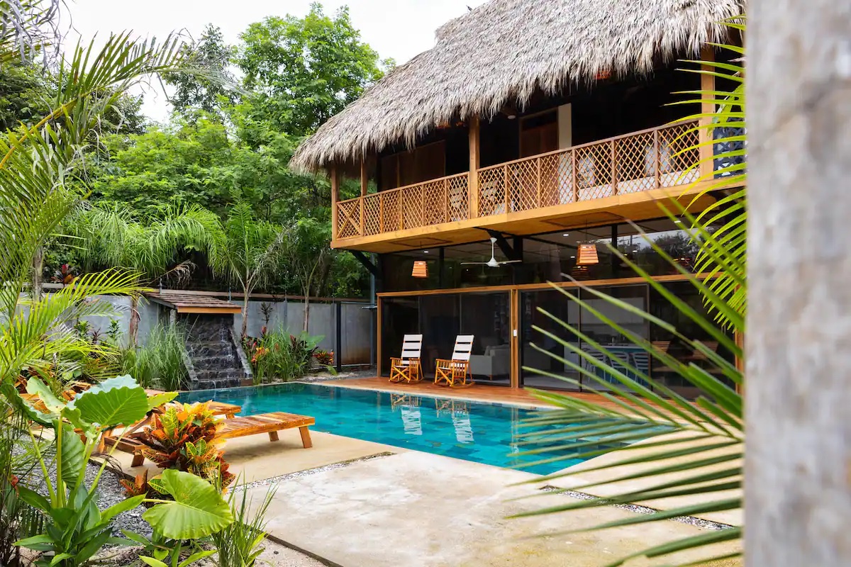 Picture of accomodation in Costa RIca (two floors and a pool are visible).