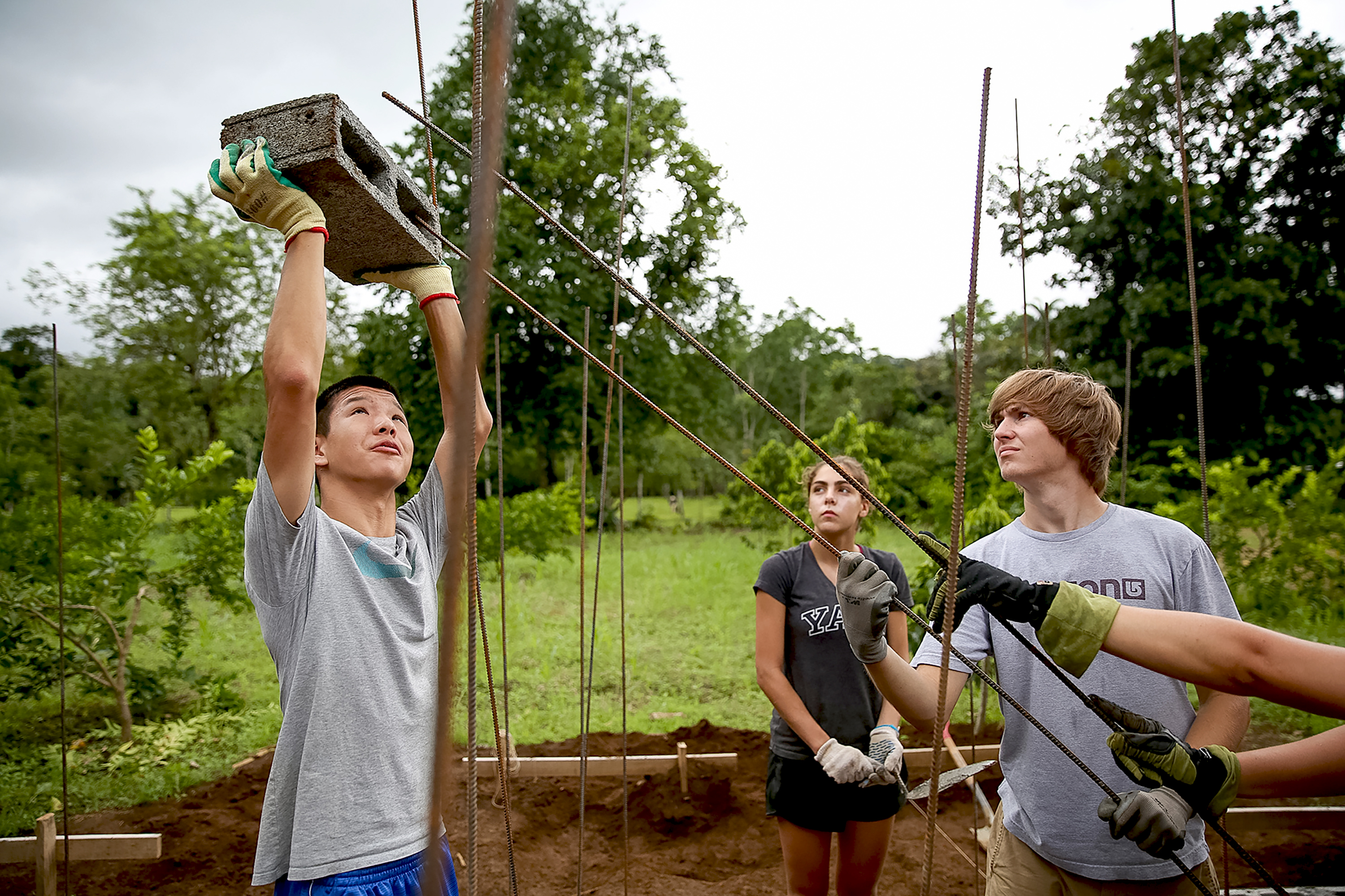 Students building the foundation of a house during a Costa Rica service program