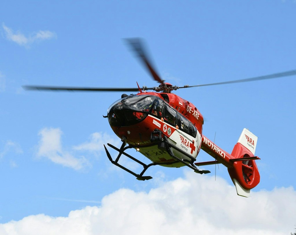 Emergency rescue helicopter in Austria bringing a teen travel documents guide