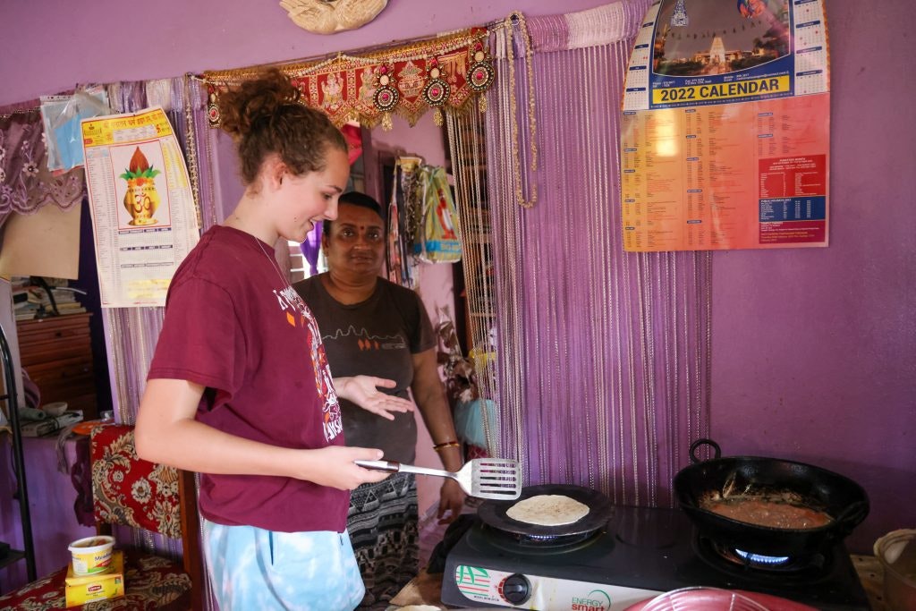 Rustic Pathways students work on meal preparation in Fiji.