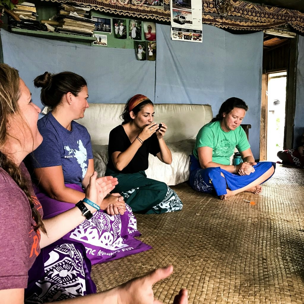 Rustic Pathways students join in a kava welcoming ceremony in Fiji. Photo: Amanda Nitzken