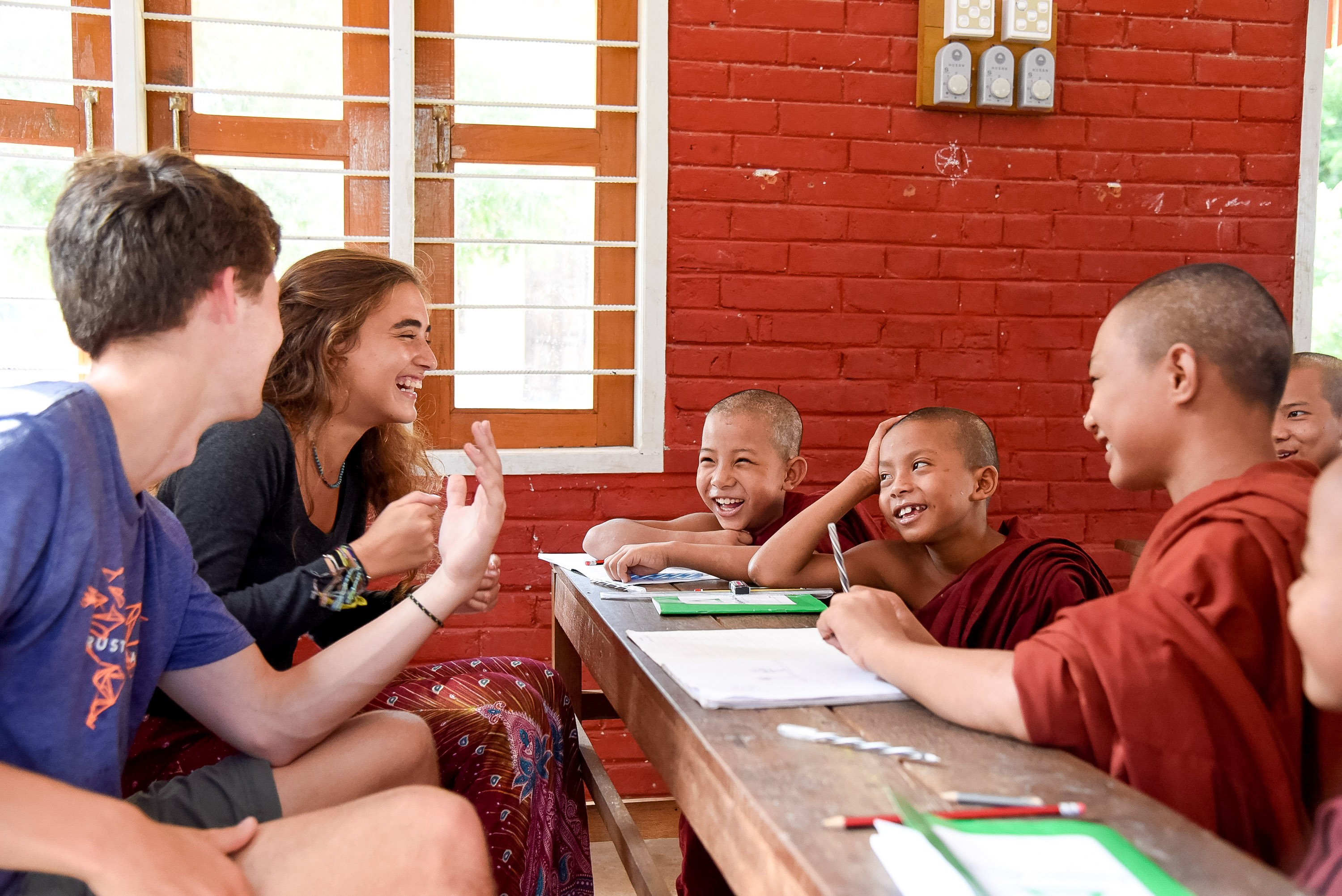 gap year students interacting with school children in Southeast Asia