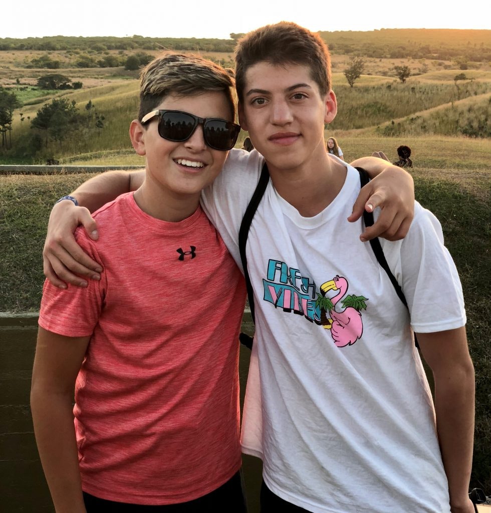 Two friends posing for the camera on a student trip abroad.