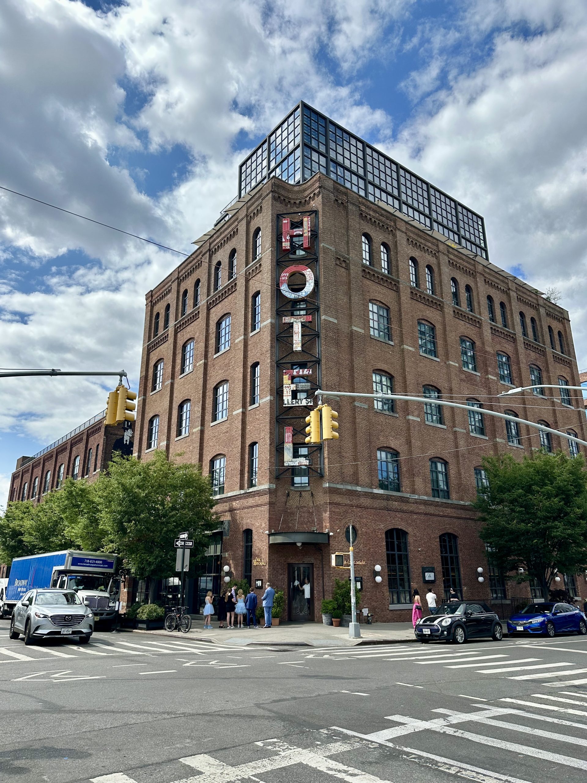 Historic brick building with ‘Hotel’ signage in Brooklyn, New York.