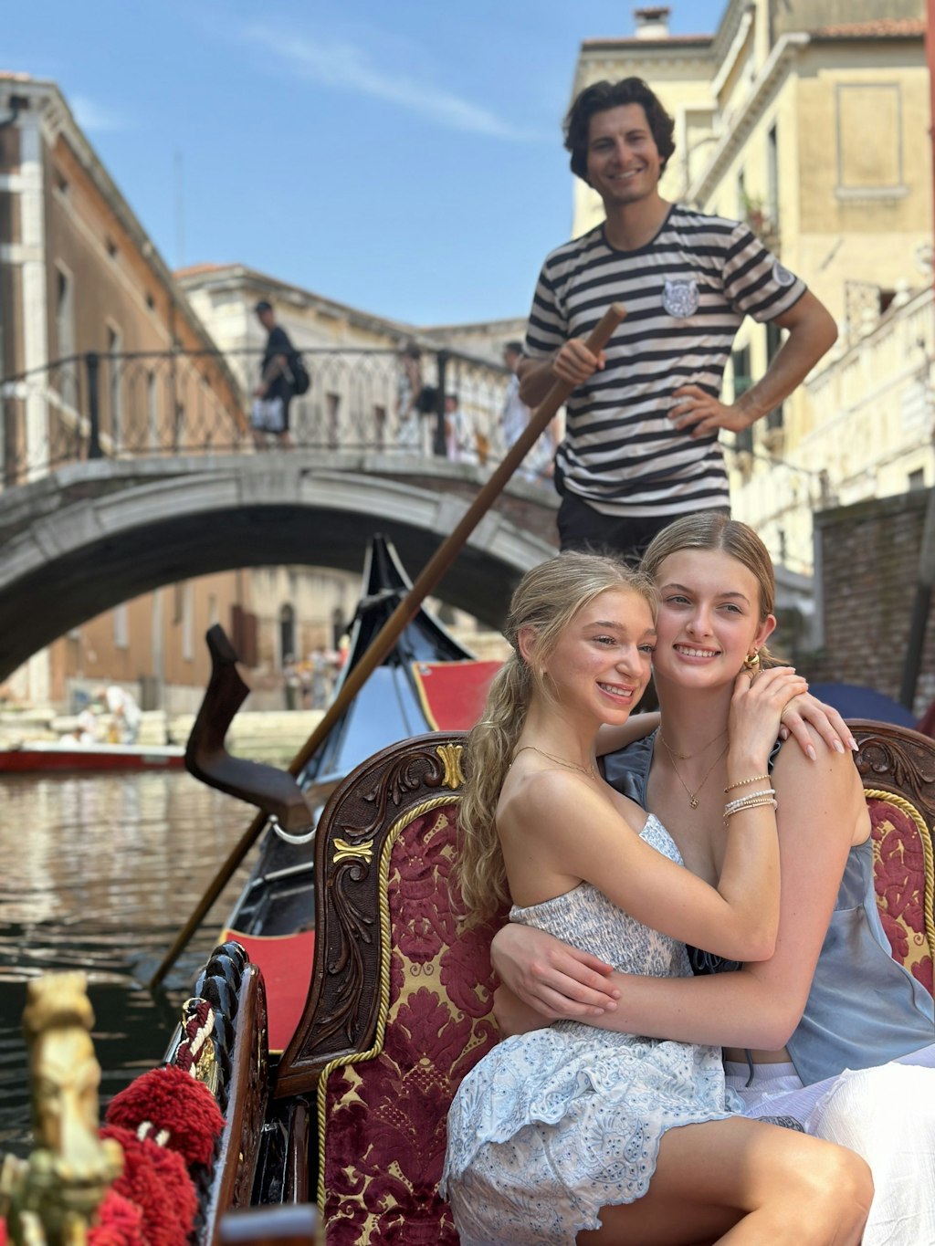 Students riding a gondola through Venice during a Rustic Pathways volunteer abroad in Europe program focused on cultural immersion.