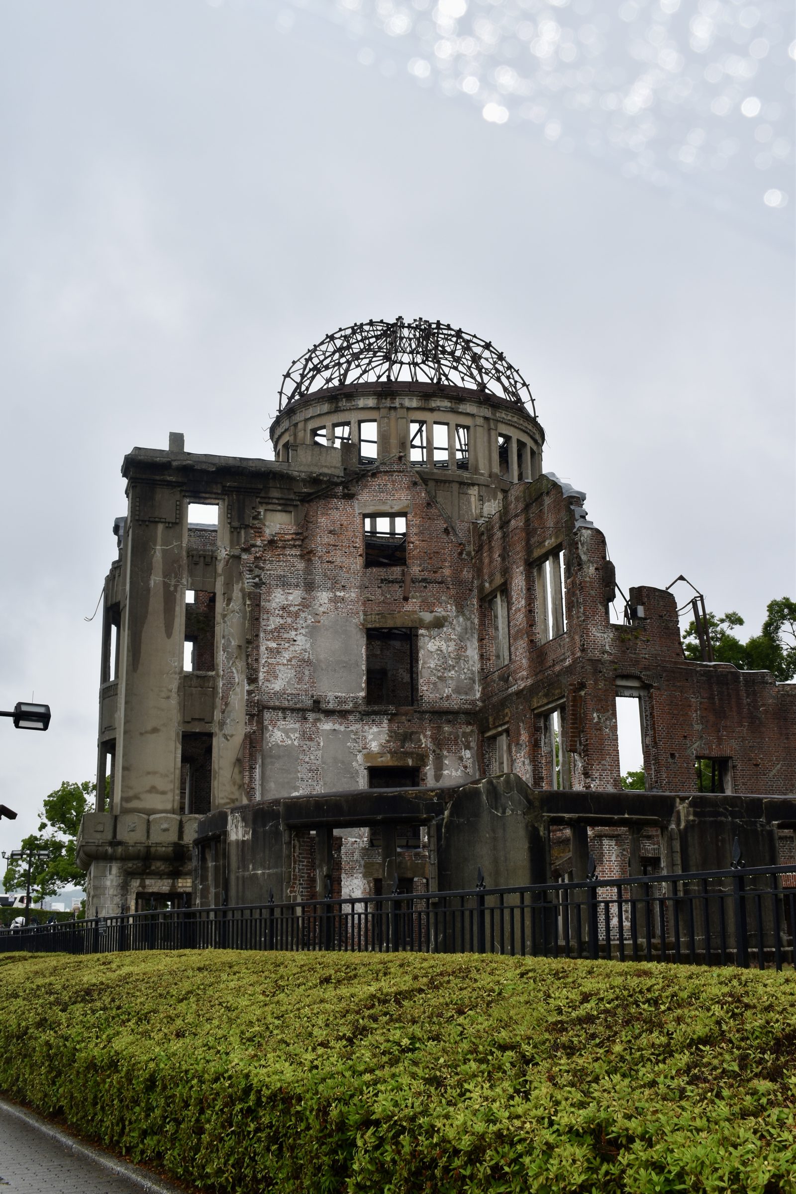 The skeletal dome and scorched brickwork of the Atomic Bomb Dome in Hiroshima