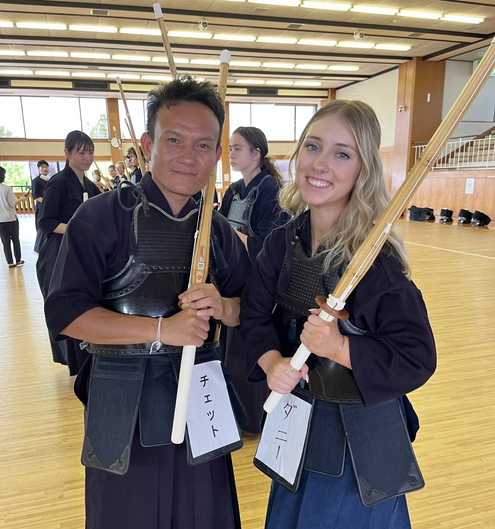 Japan Teen Tours & Summer Programs for High School Students featuring teens practicing kendo with local instructors during cultural immersion activities.