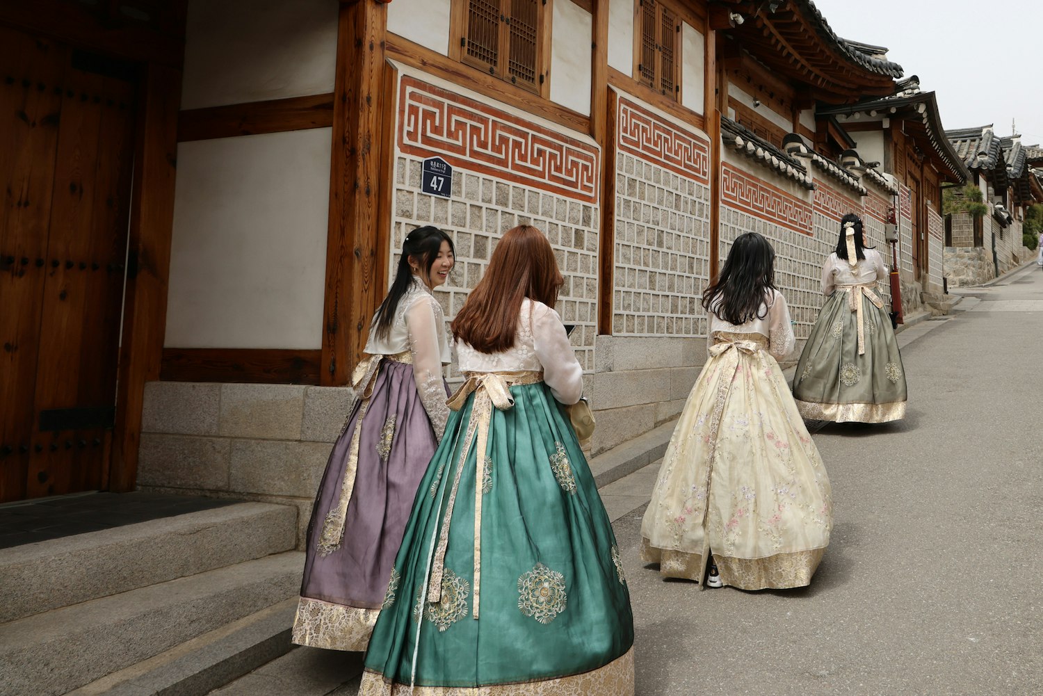 Students wearing traditional Korean hanbok in Seoul