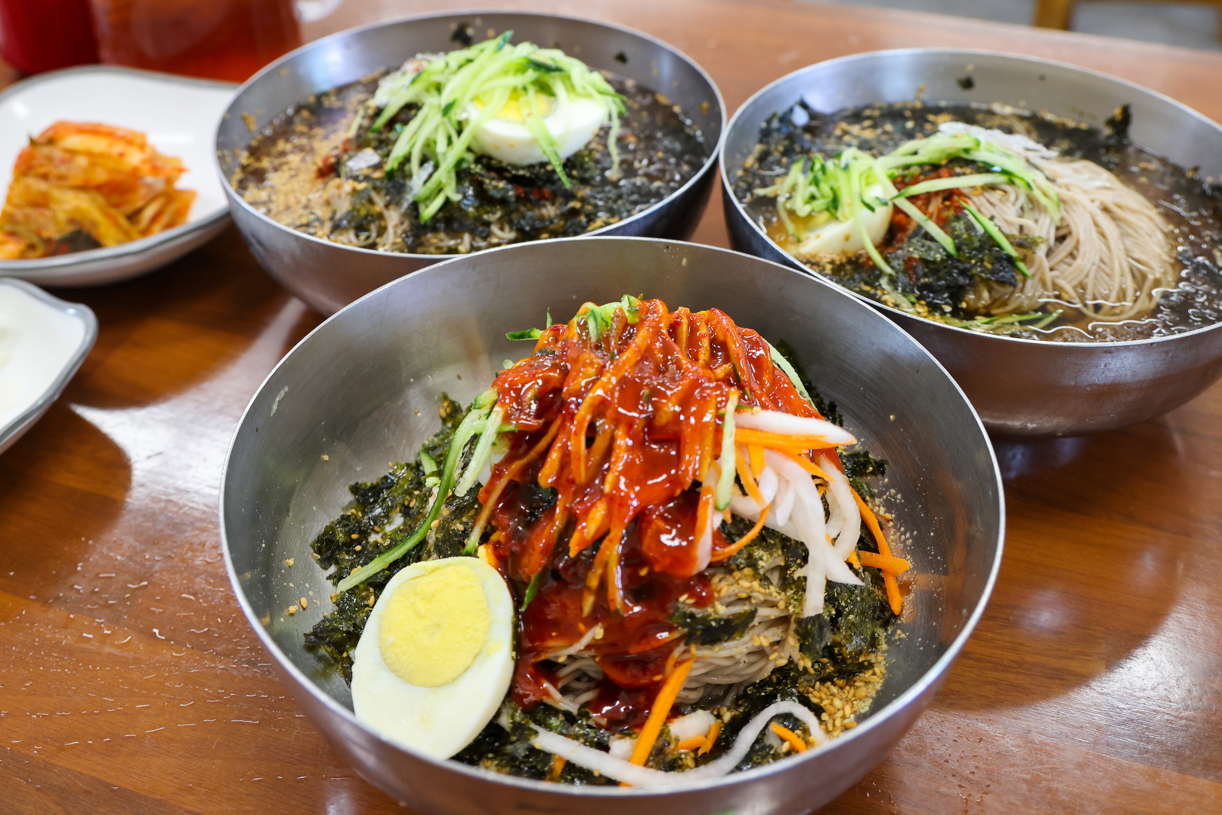 Traditional Korean food with vegetables and a boiled egg.