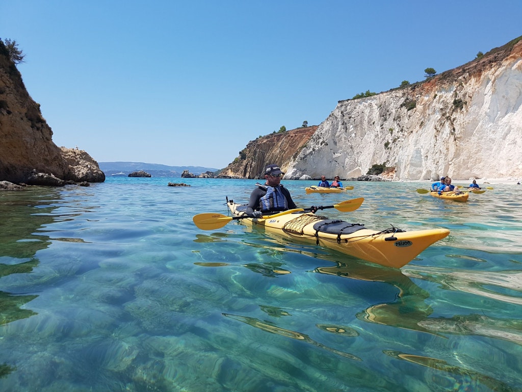 Picture of man rowing on a canoe in Kefalonia, Greece