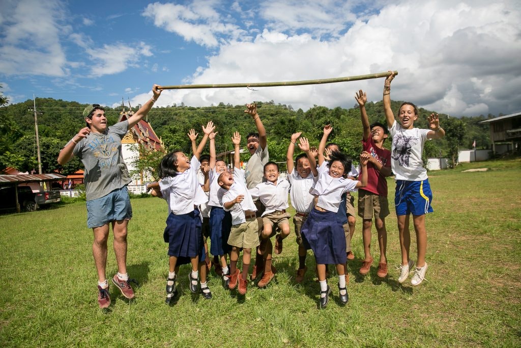 Students in Thailand experiencing simple living conditions during Mekong expedition