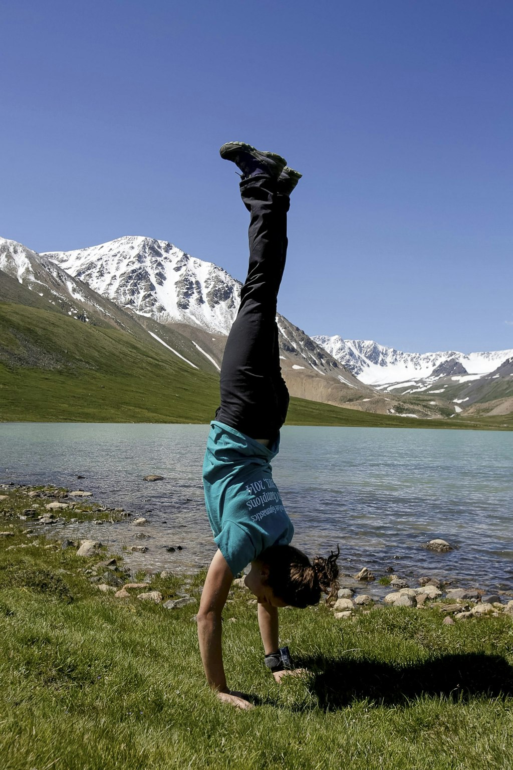 Handstand in a mountain area. #generational travel trends