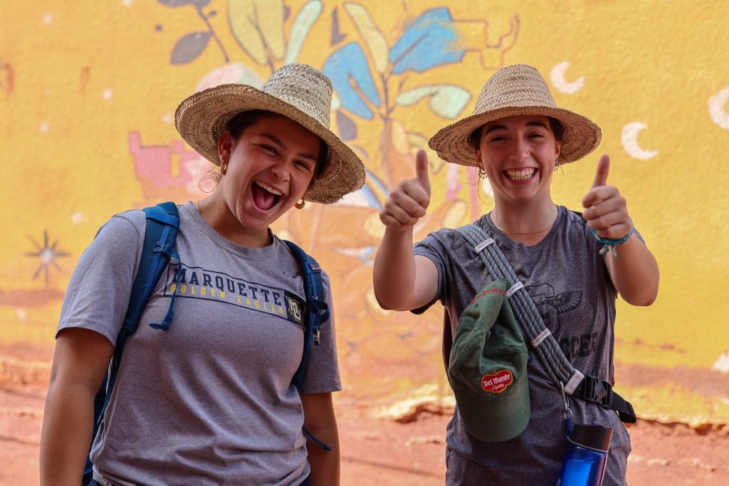 Teen travelers smiling while exploring Morocco on a teen tour.