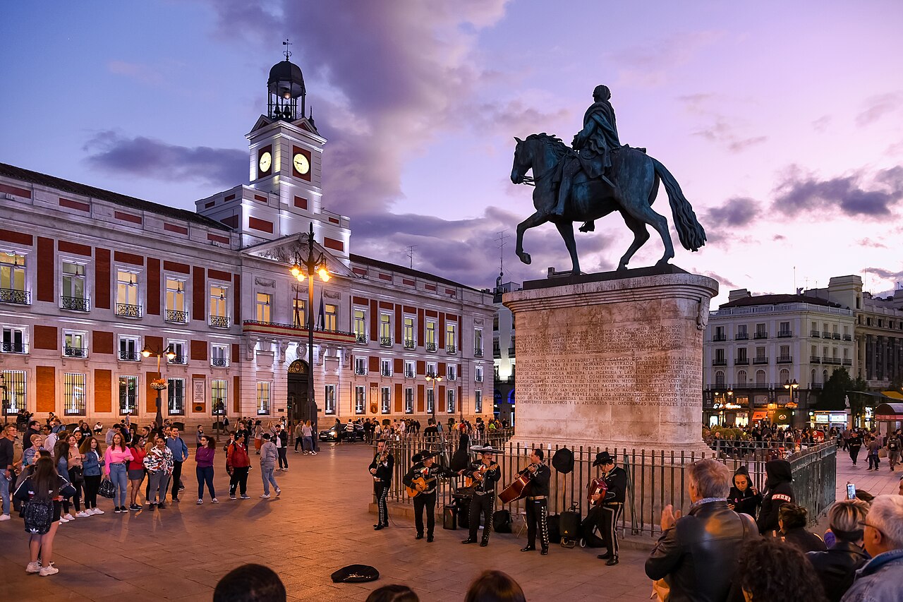 The equestrian statue at Puerta del Sol in Madrid at dusk