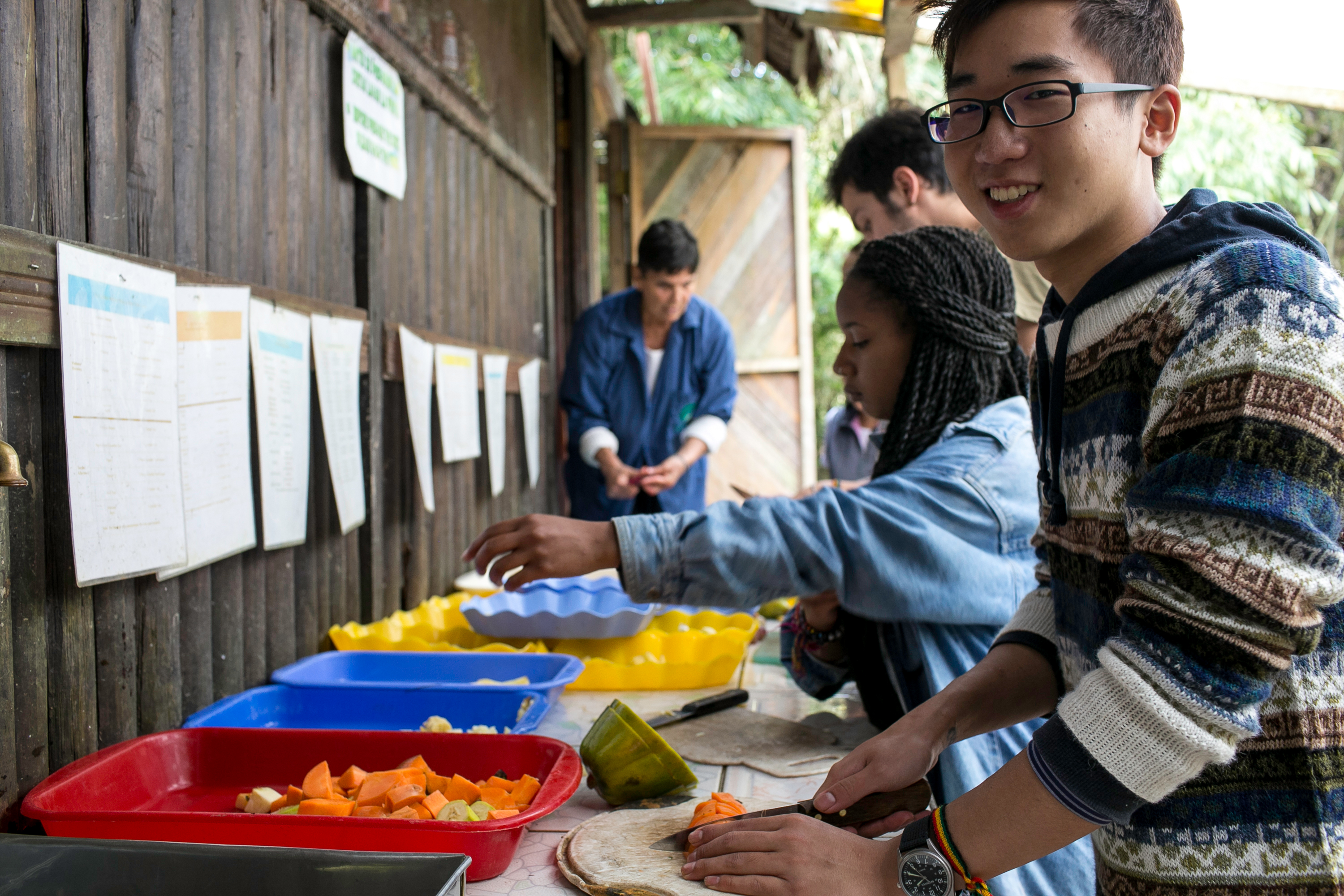 Students serving themselves food in Peru.