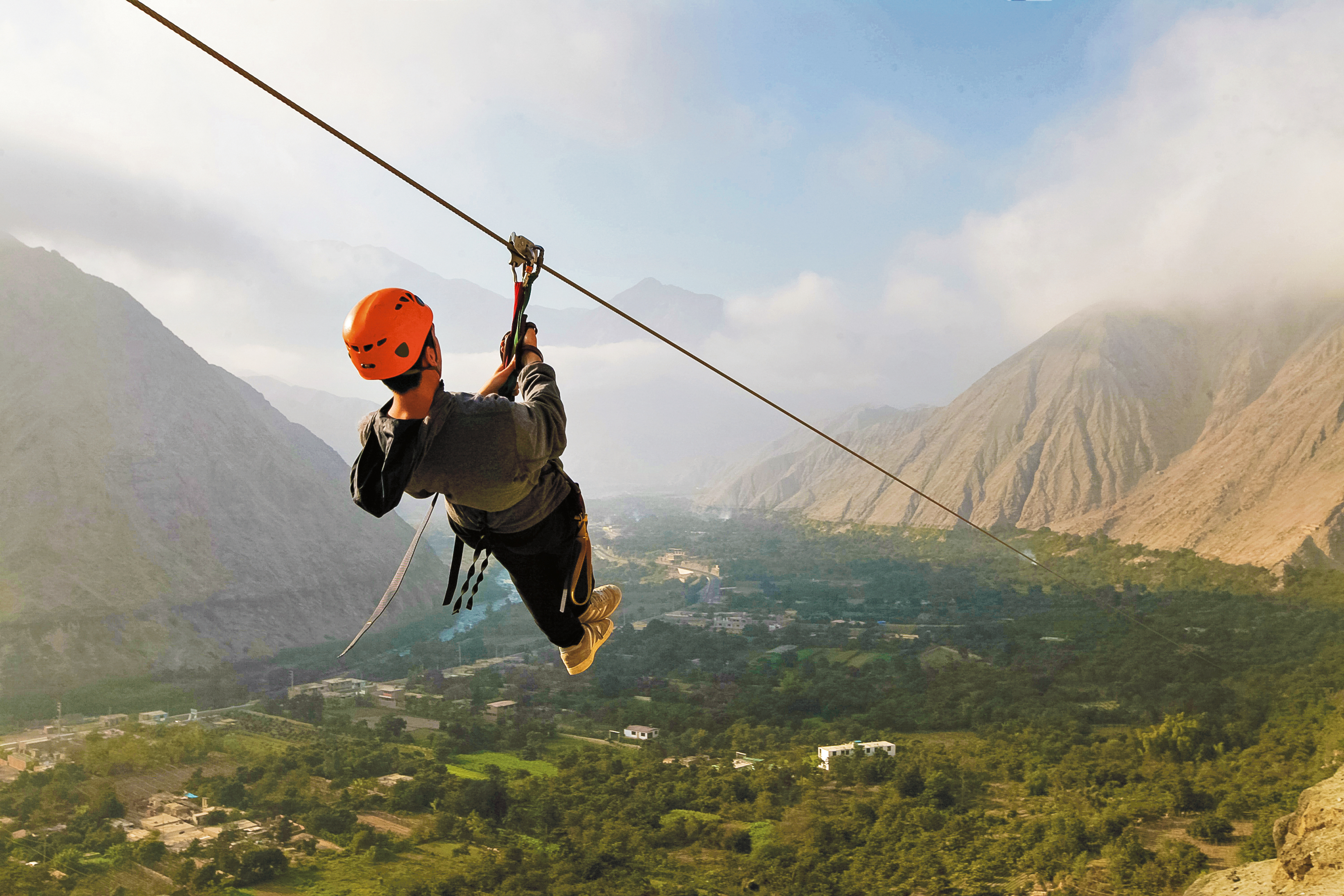 Student ziplining in Peru.