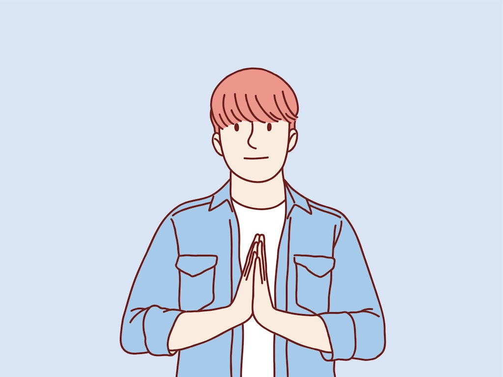A digital illustration of a young man in a denim jacket pressing his hands together in a respectful greeting. greetings in different languages