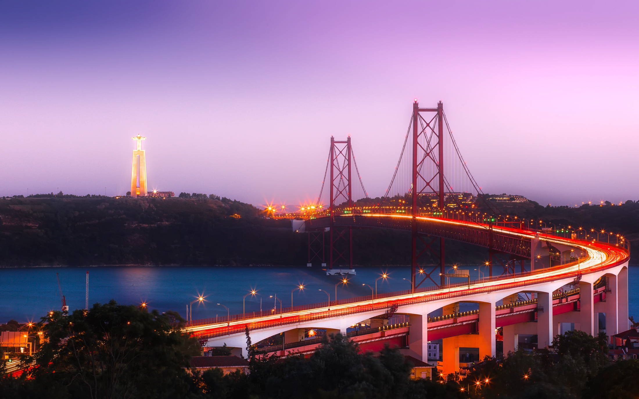 Night time view of bridge in Lisbon, Portugal