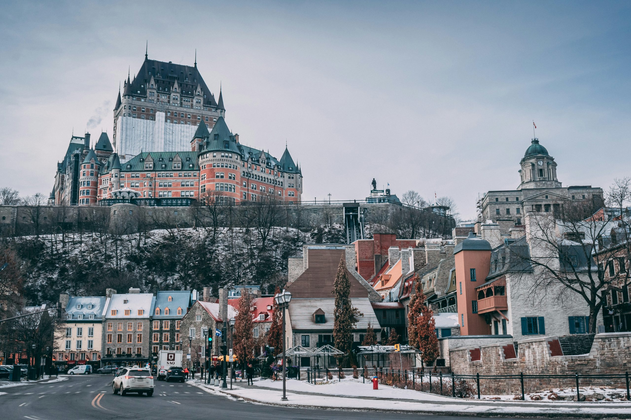 The Fairmont Château Frontenac rises above the snow-dusted rooftops of Old Québec's lower town.