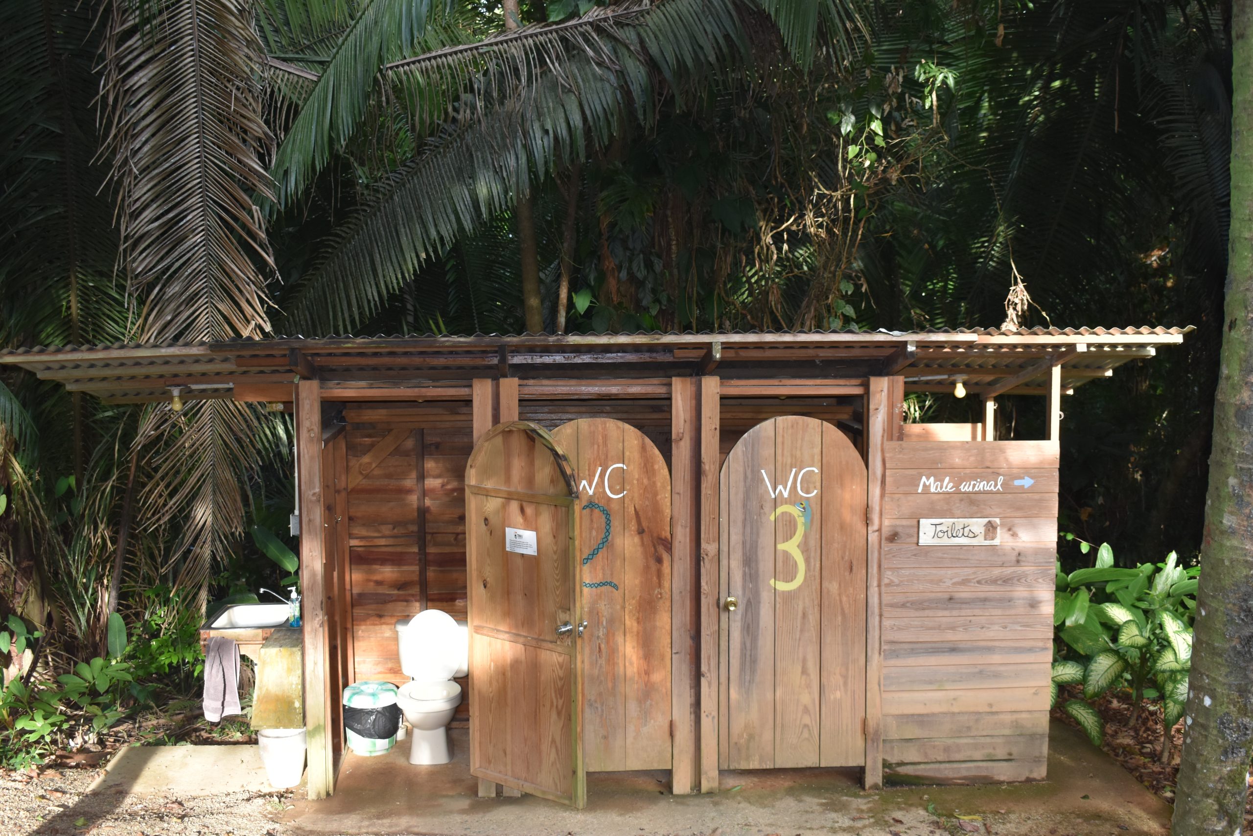 Outdoor bathroom stalls in Belize, Rustic Pathways Base House.