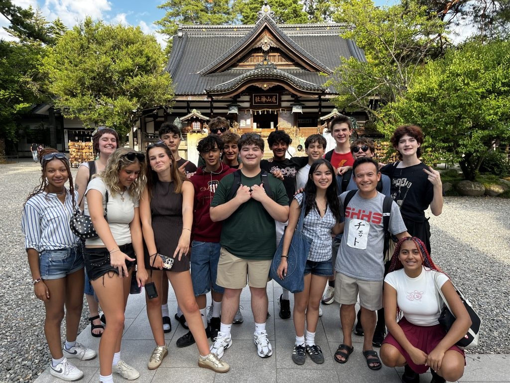 Rustic Pathways Tokyo to Seoul 2026 cohort at a temple in Japan