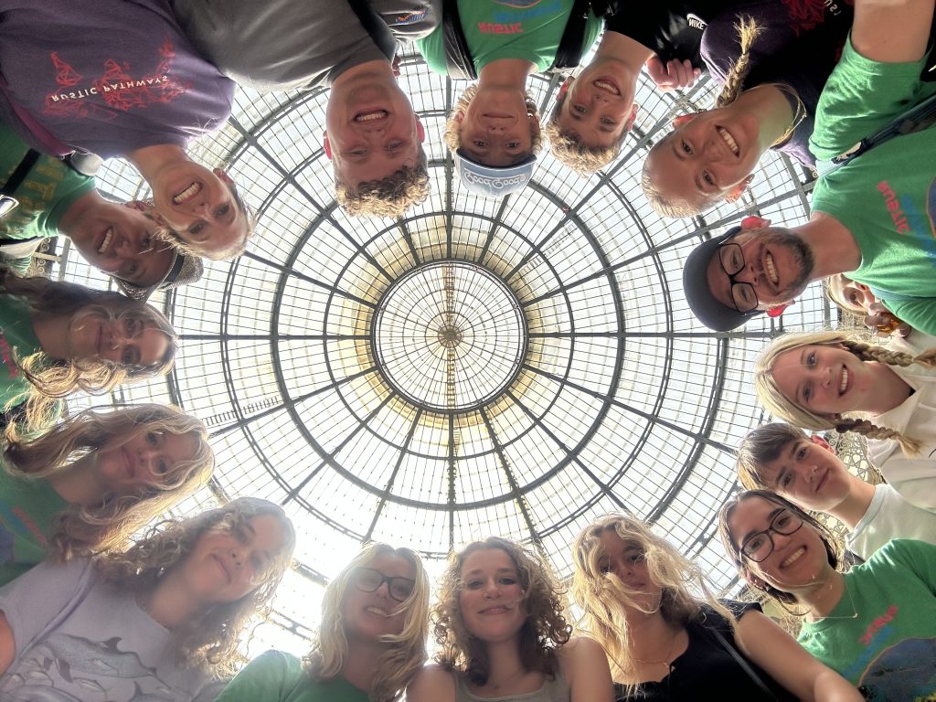 Teen tour participants with program leaders during a Rustic Pathways travel program in Europe.