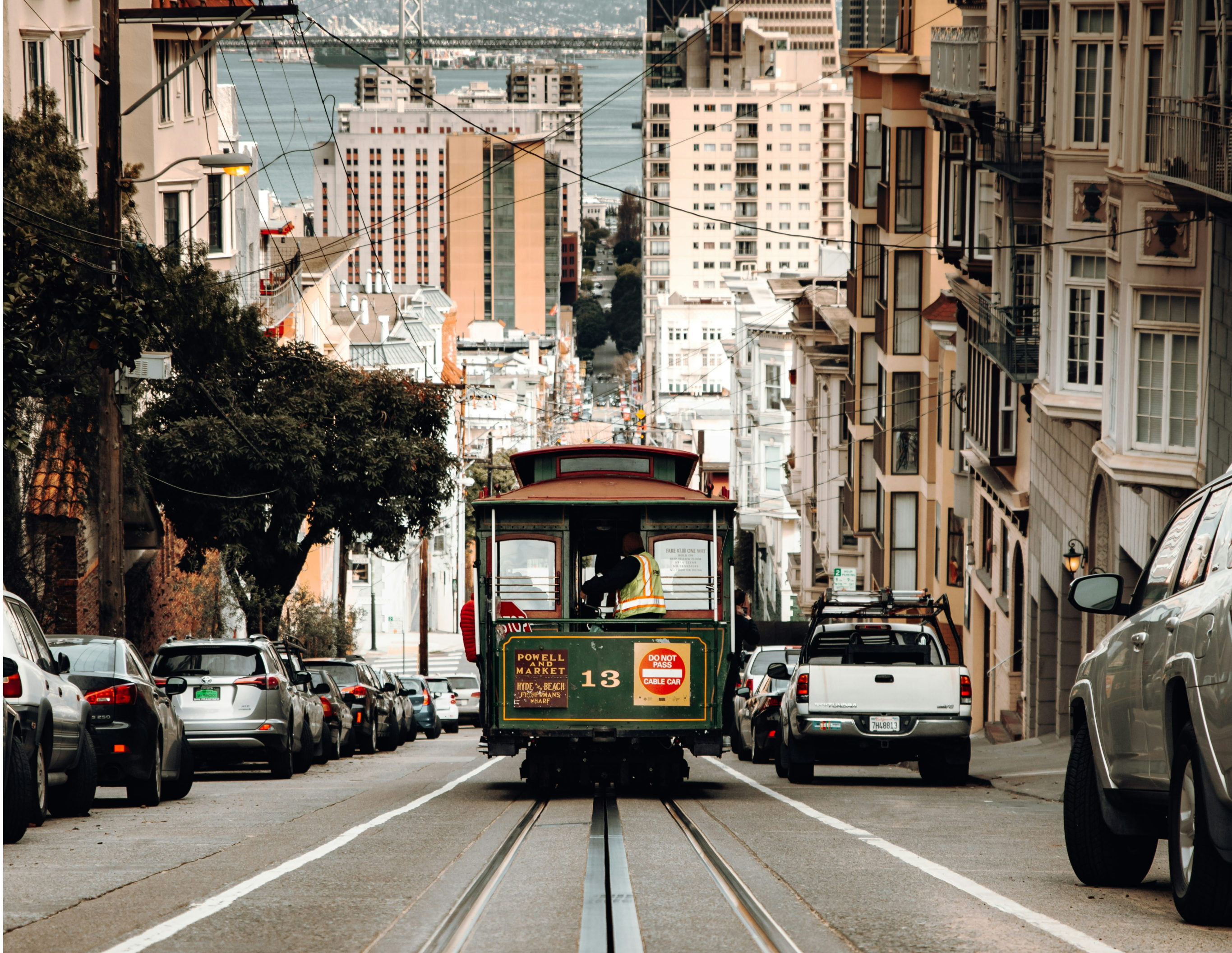 A San Francisco cable car on a steep city street.