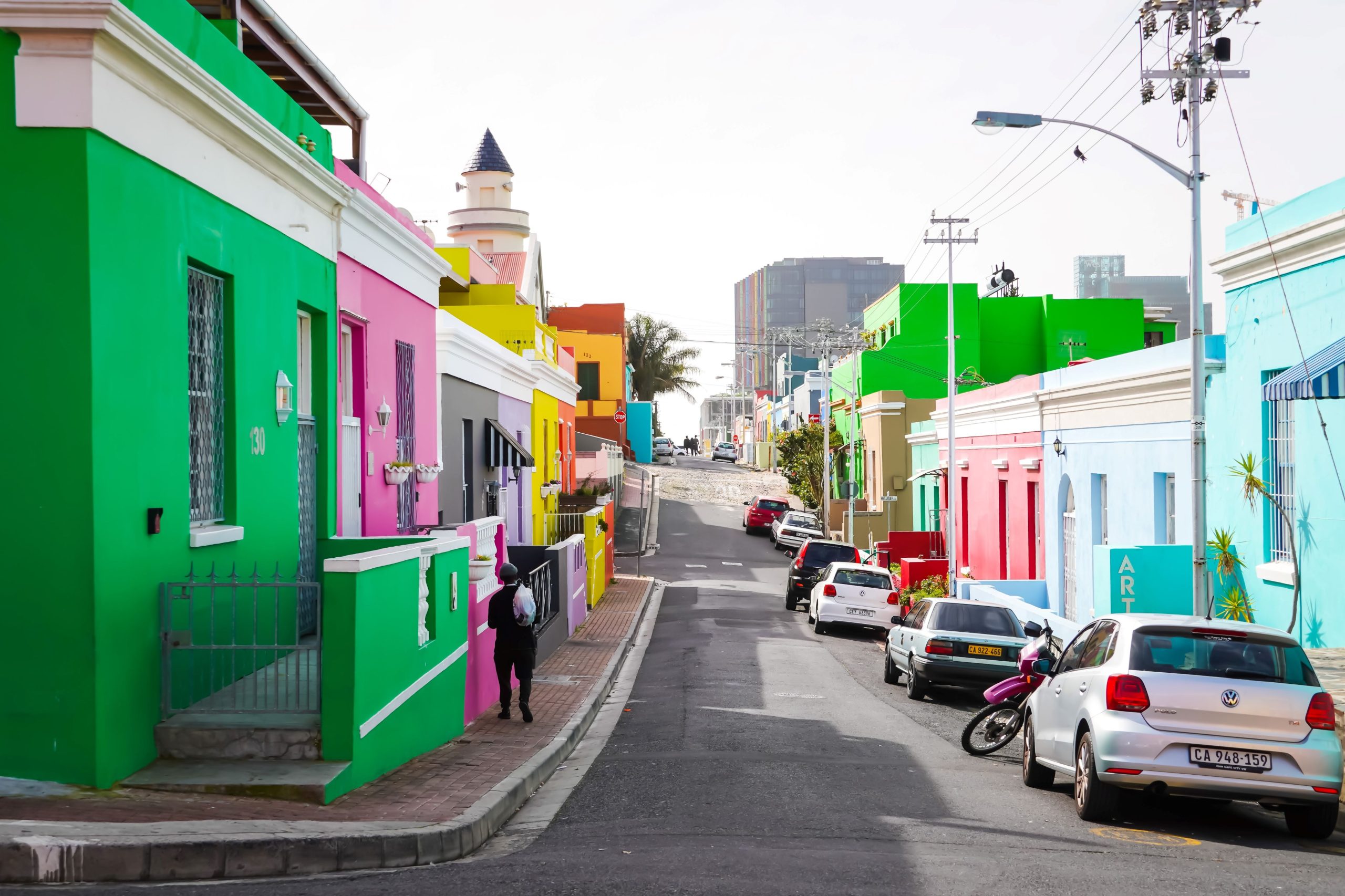 Colorful houses line a sloped street in the Bo-Kaap district of Cape Town