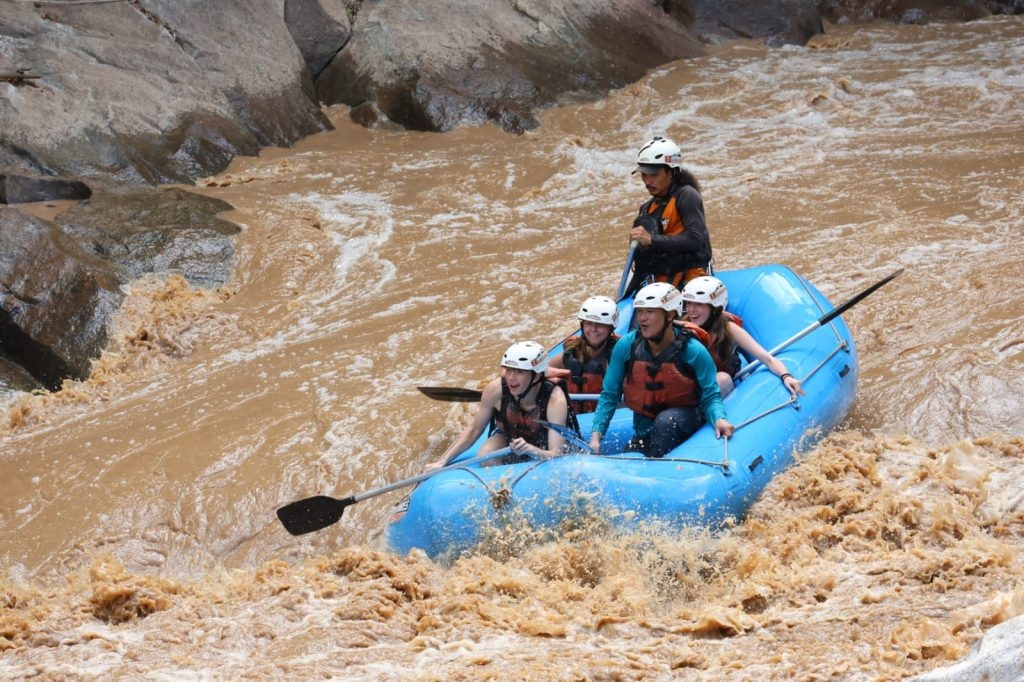 Students rafting in Thailand.