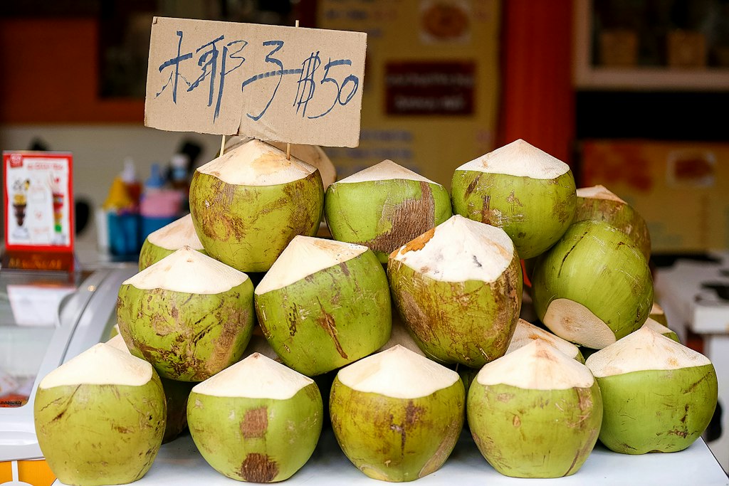 Coconuts for sale at a market