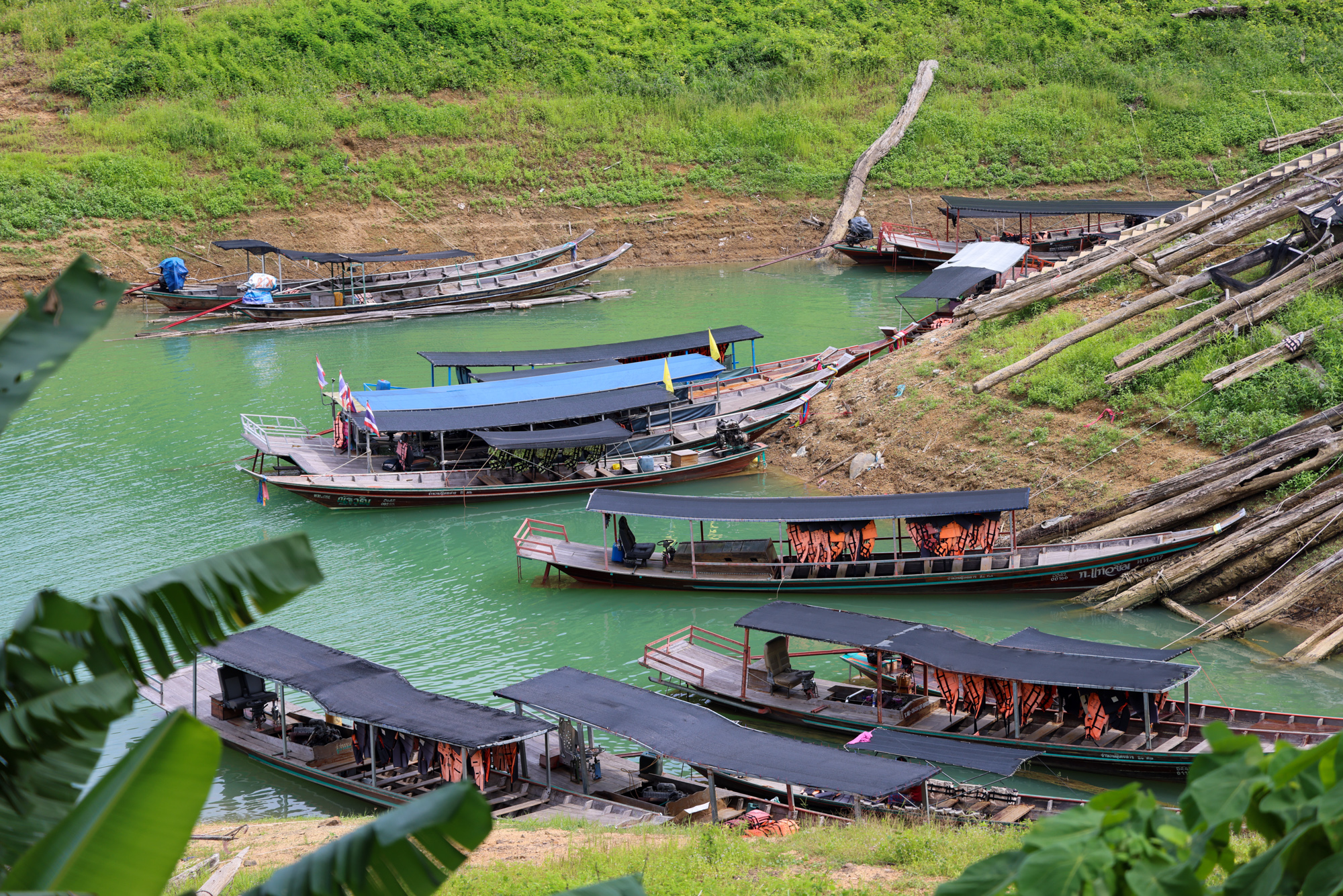 Canal in Thailand with boats.