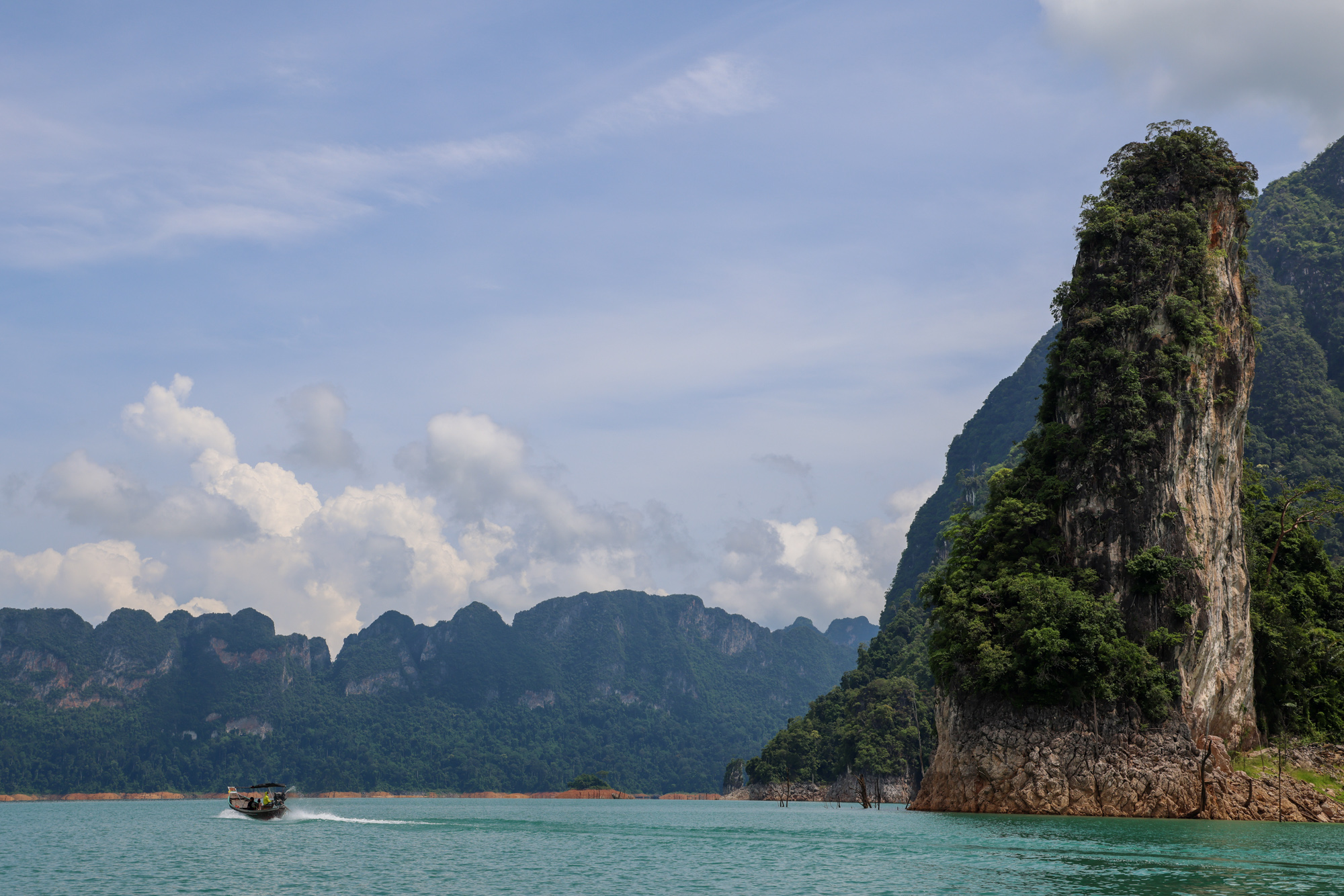 View of ocean and mountains in Thailand.