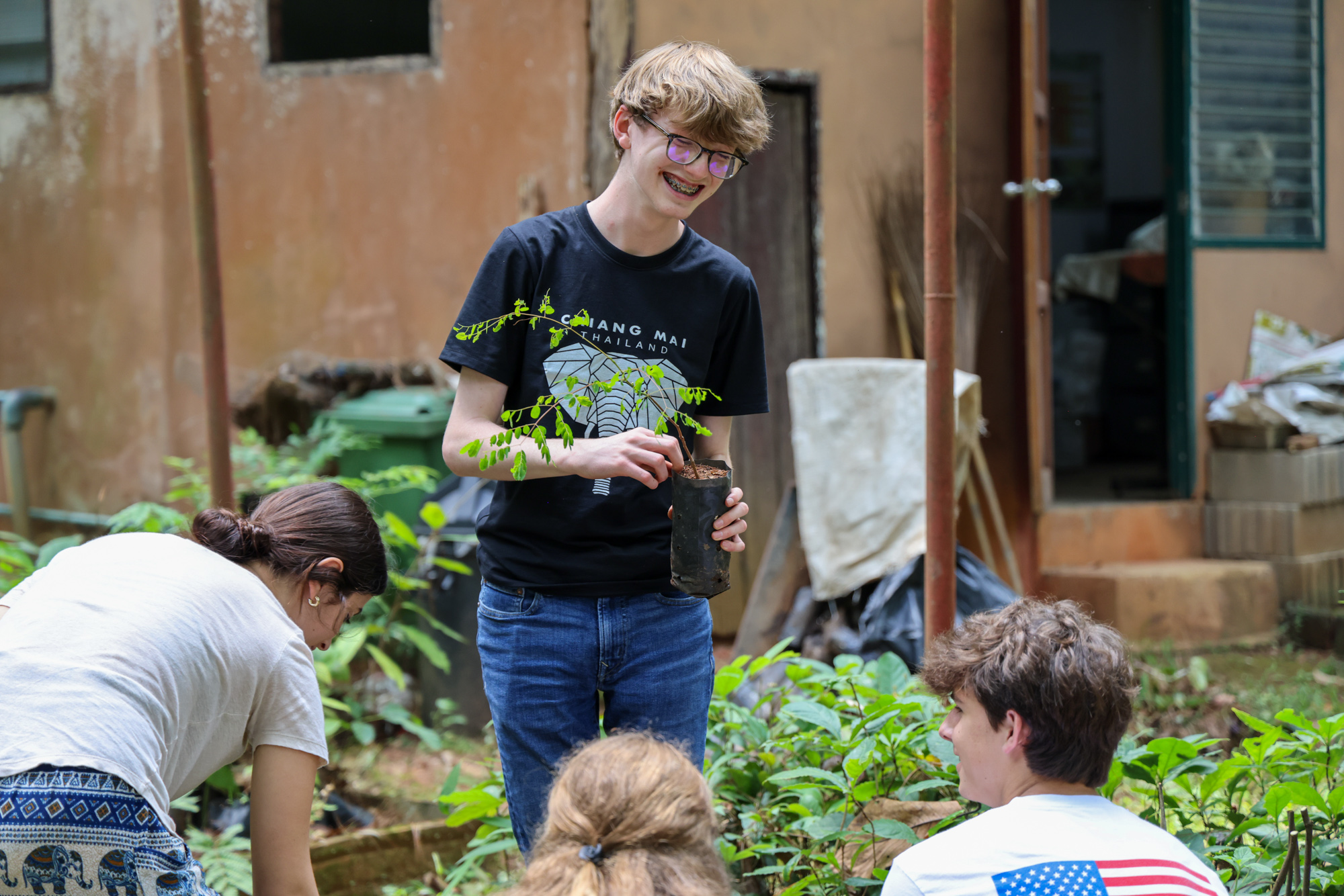 Students working in service project in Thailand.