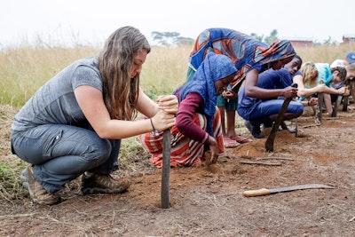 Volunteer in Africa students assist locals on a sustainable development project during a volunteer abroad trip to East Africa
