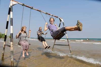 Volunteer in Africa students take time to relax on the beach during a volunteer abroad trip to the Serengeti and Zanzibar