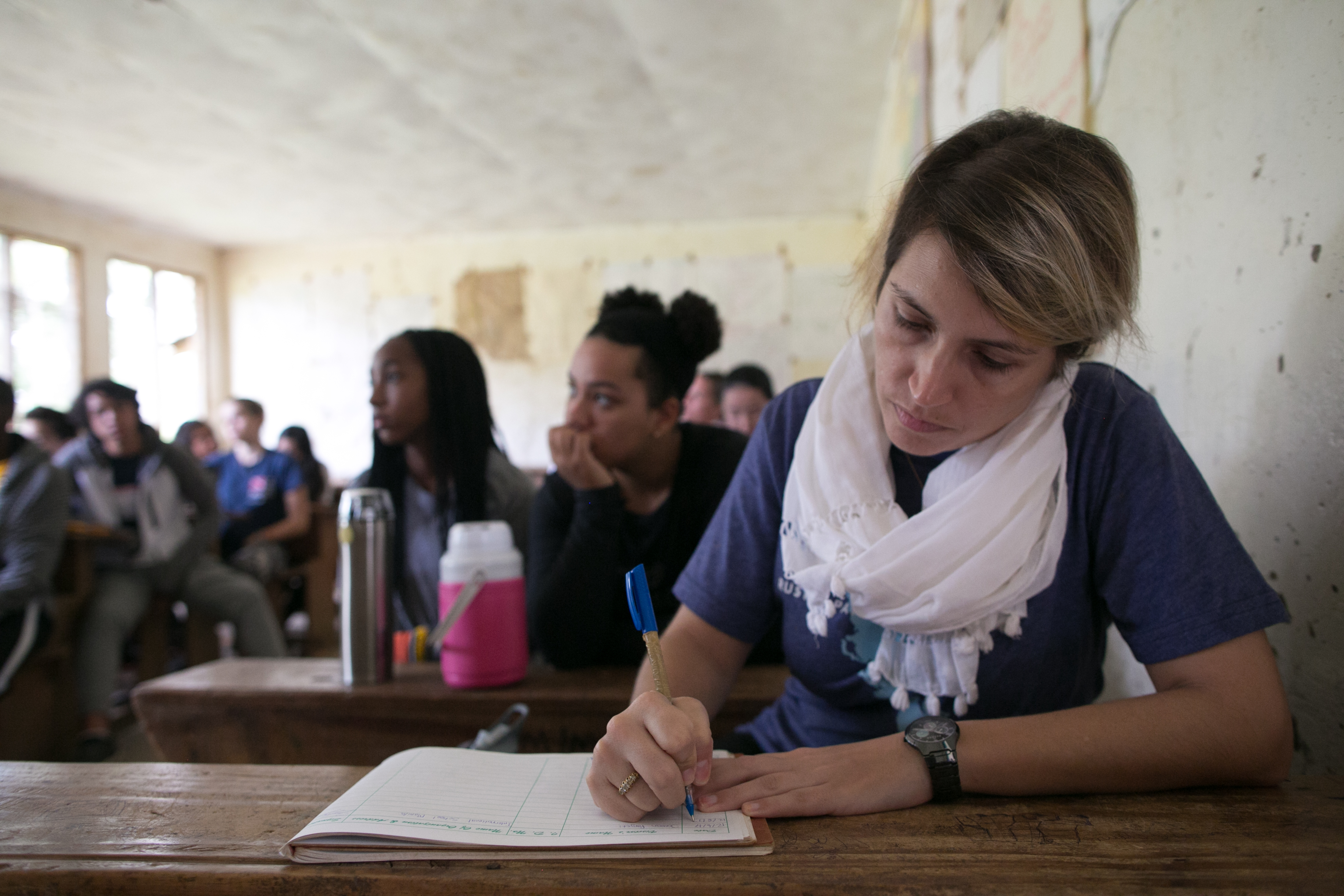 An educator leads a Rustic Pathways Group Travel program
