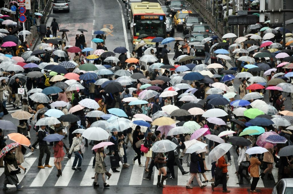 Umbrellas in use on a rainy day in Tokyo, Japan