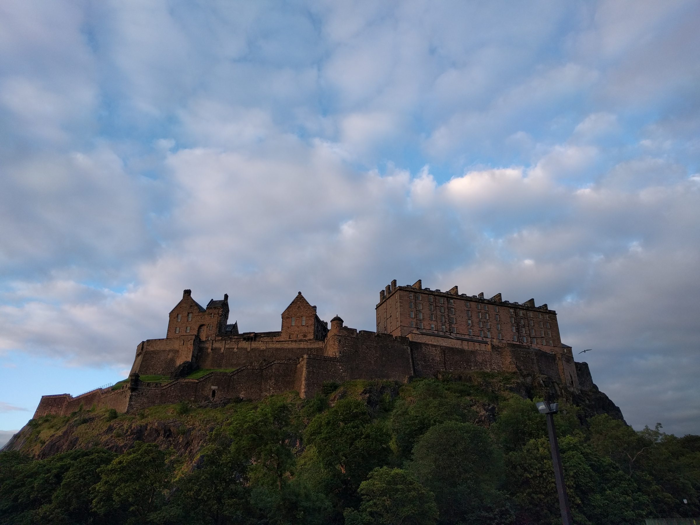 Edinburgh Castle on its volcanic crag under a bright sky